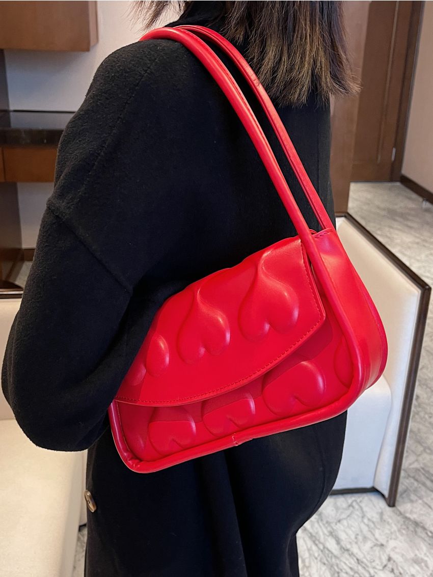 Heart Embossed Flap Saddle Bag
