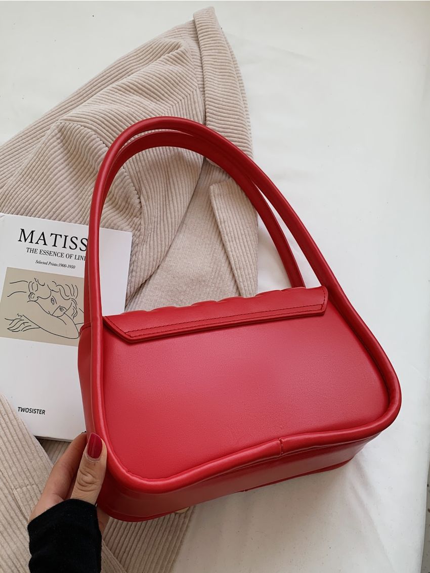 Heart Embossed Flap Saddle Bag