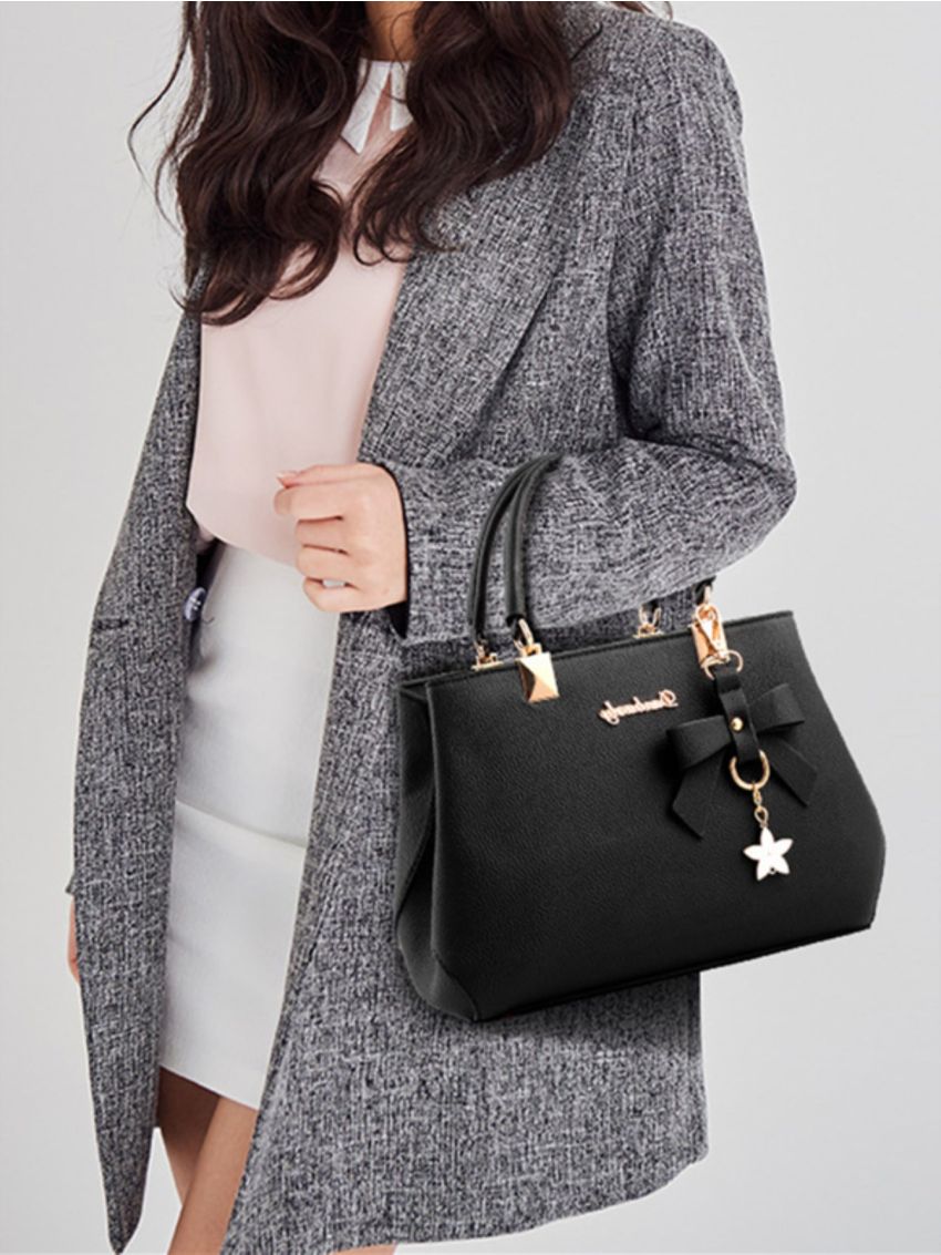 Pebble Embossed Bucket Bag With Bow Charm