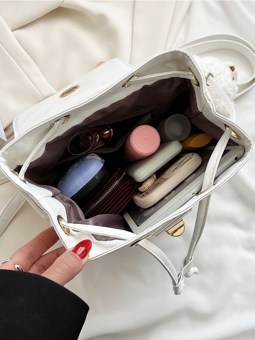 Quilted Twist Lock Flap Backpack Without Bag Charm