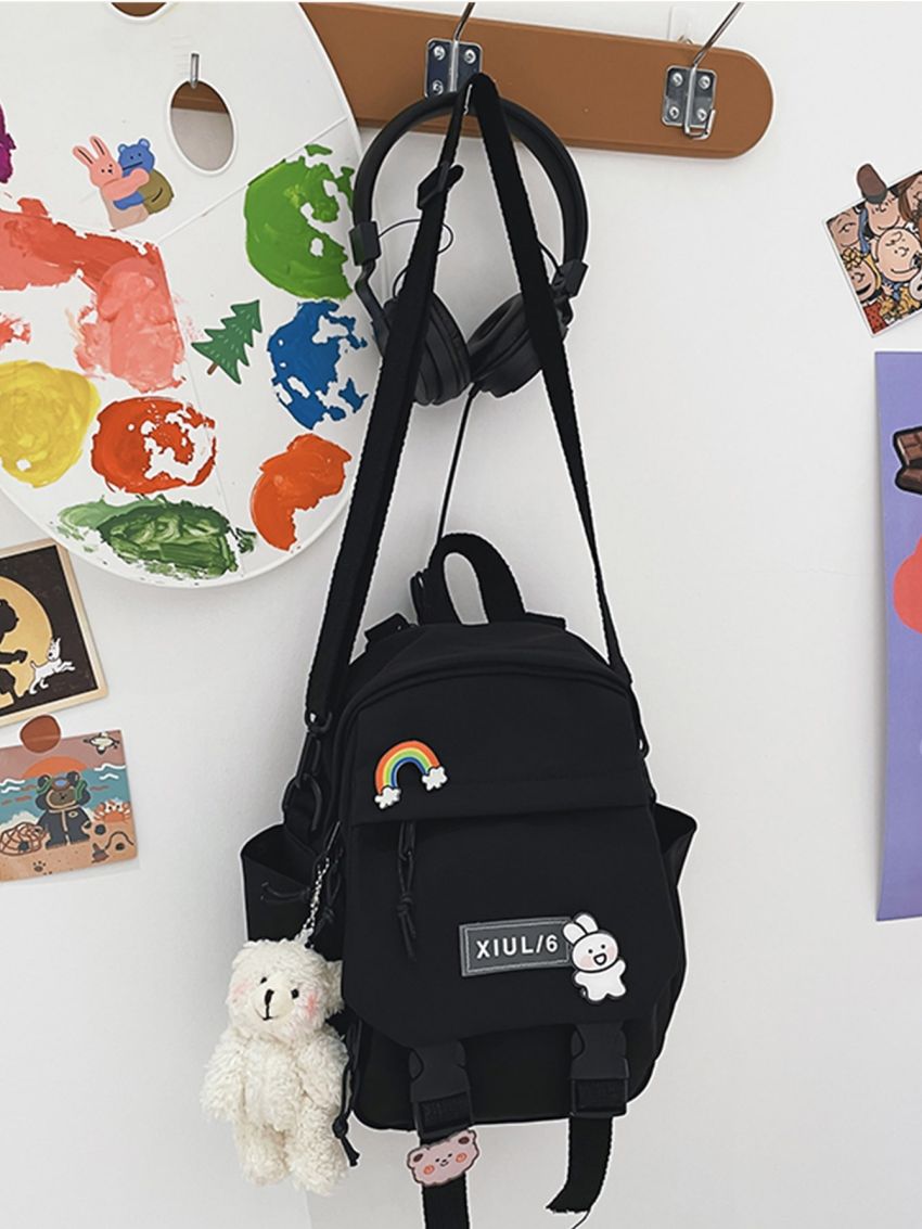 Random Badge Decor Release Buckle Front Backpack