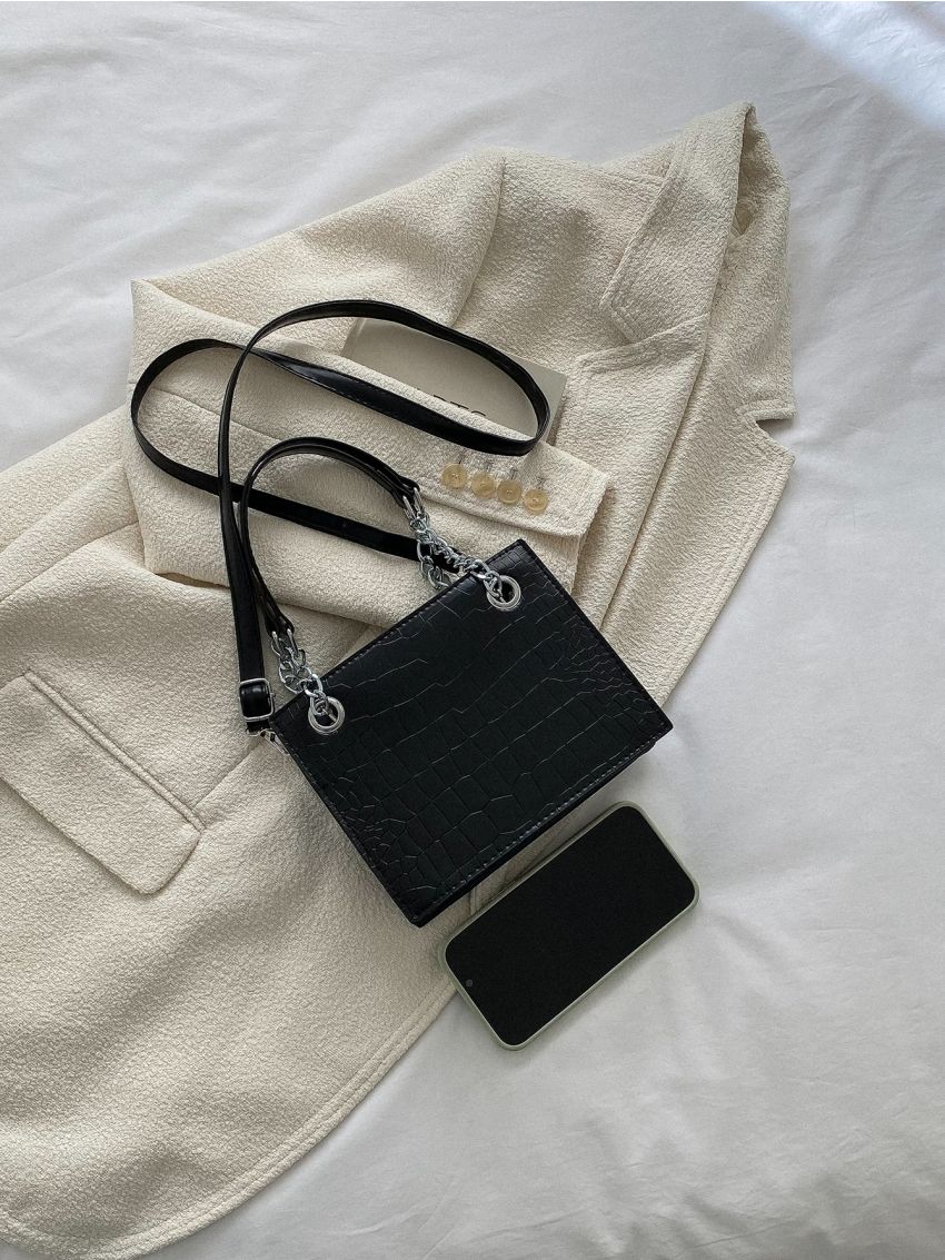 Mini Square Bag Geometric Embossed Grommet Eyelet Detail