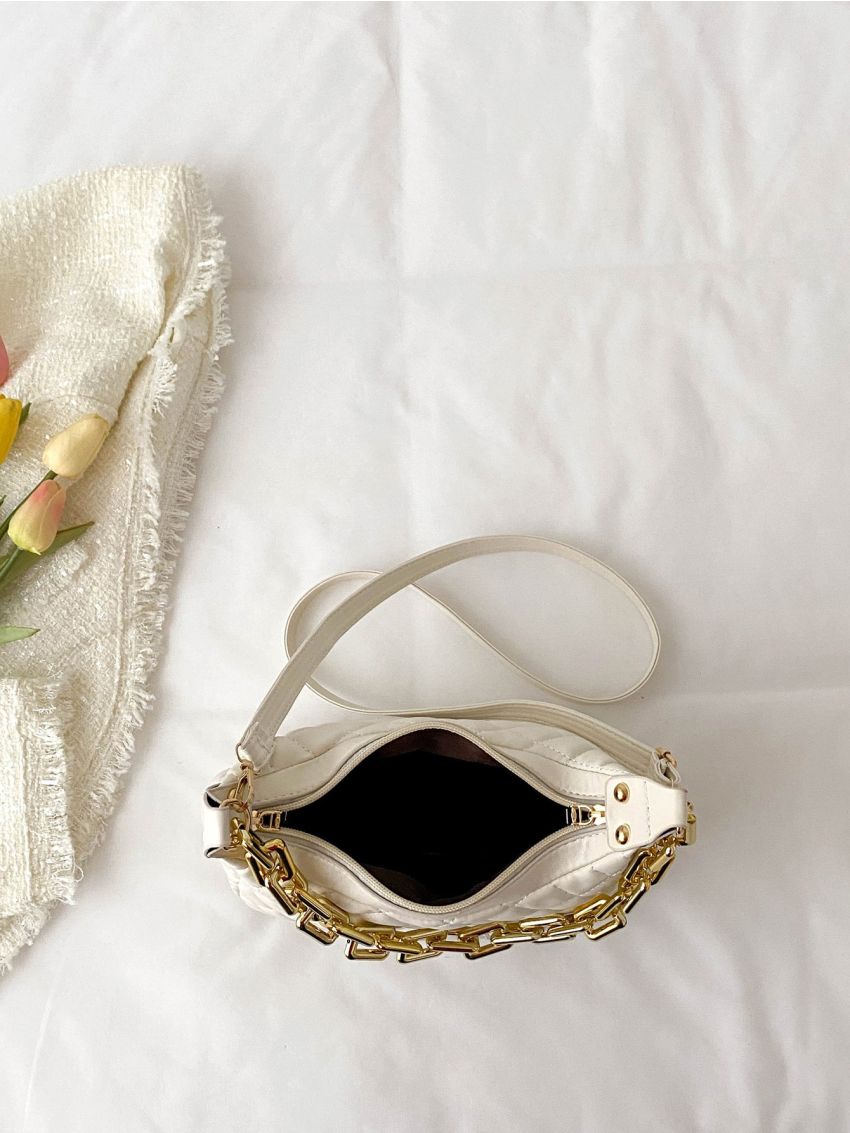 Quilted Embossed Chain Baguette Bag