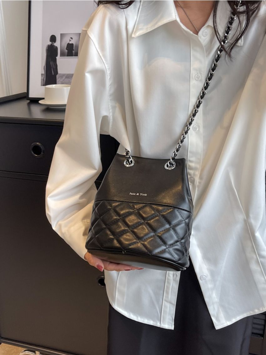 Mini Quilted Letter Graphic Chain Bucket Bag
