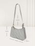 Heart Embossed Baguette Bag