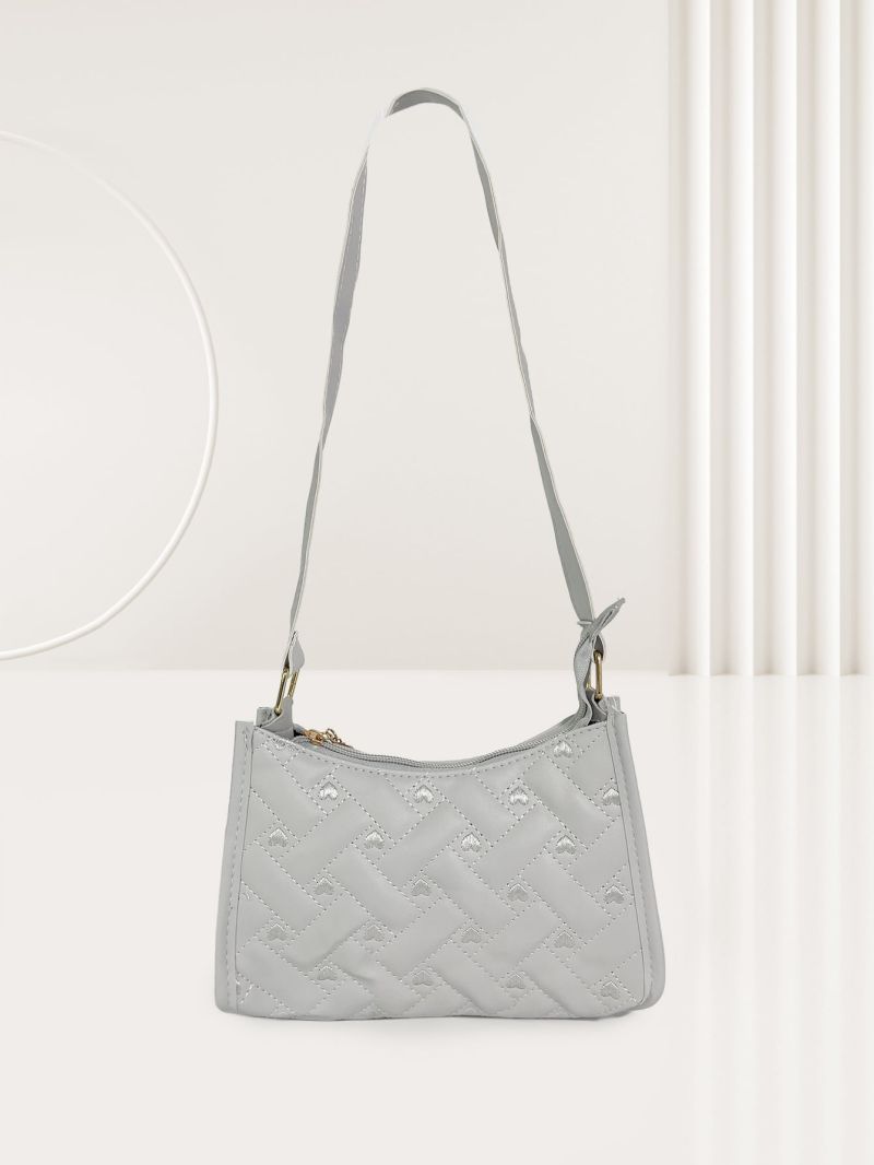 Heart Embossed Baguette Bag